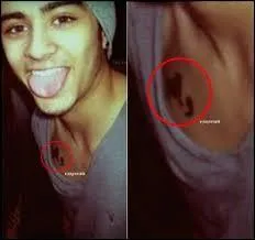 Que veut dire le tatouage, crit en arabe, qu'il a sur le torse ?