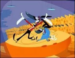 Comment s'appelle le petit rat rondouillard en bleu de travail dans   Ratz   ?