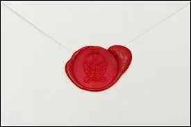 En quelle matire est la lettre qu'Edward envoie  Jacob et de quelle couleur est l'encre utilise ?