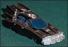 A quoi sert le petit bouton rouge dans la voiture du MIB ?