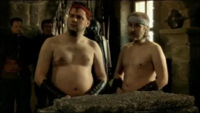 Combien de plaques de briques Karadoc doit-il briser lors de son tour devant Arthur ?