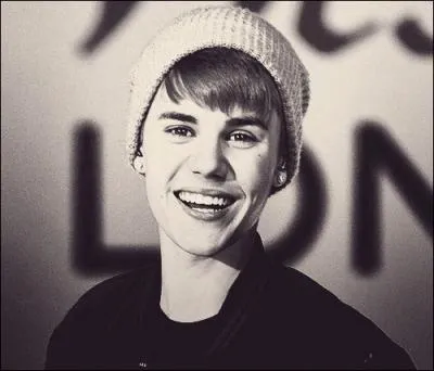 Avec qui Justin s'est-il associ  deux reprises pour une chanson ?