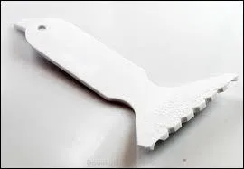 Cet outil qui semble fait pour peigner les chiens est un outil de ?