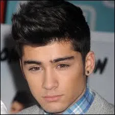 Qu'a-t-il Tatou en arabe sur son torse ?