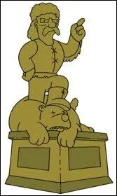 Qui a une statue  son effigie sur la place de cette ville ?