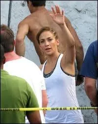 Qui est cette star qui 'fait coucou' aux paparazzi ?