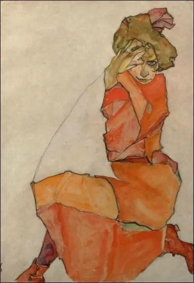 Femme en robe orange,