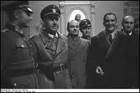Secrétaire général à la police du régime de Vichy, il a participé avec les nazis à l'organisation de la rafle du vel' d'Hiv à Paris :