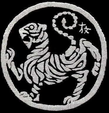 Quelle est la signification du symbole du karat  Shotokan  s'appelant le  Tora no maki 
