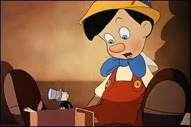 De quelle couleur est la robe de la fe dans  Pinocchio  ?
