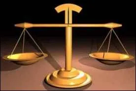 Juste ou faux. L'allégorie qui représente la justice est un personnage de femme borgne portant balance et glaive.