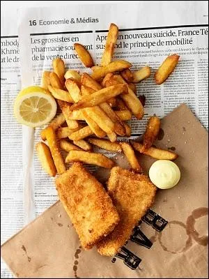 Le plaisir du gourmand en automne et en hiver est de n'avoir plus besoin d'excuse pour manger plus riche. En photographie, on aperoit du poisson en panure et des frites, plat emblmatique de ?