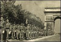 Alors qu'elles constituaient près de 60 % des troupes françaises de libération, quelle a été  la récompense  des troupes coloniales lors du défilé de la libération ?