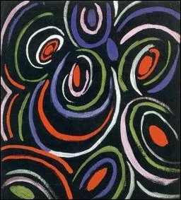 Voici un enchevtrement de cercles de couleurs vives sur fond noir, sorti de l'imagination de l'artiste... ?