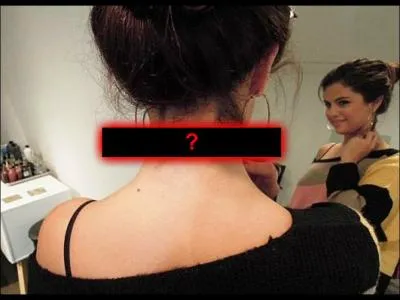 Qu'y a-t-il de marqu sur son tatouage ?