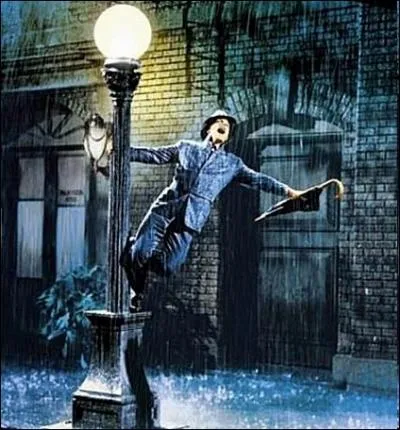 De quel film musical amricain est extraite cette squence culte ou Gene Kelly chante et danse sous des trombes d'eau ?