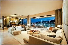 Traduisez :  Il a un appartement .