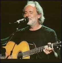 Selon Maxime Le Forestier dans quelle ville trouve-t-on une maison bleue adosse  la colline ?