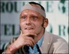 Quel pilote, triple champion du monde, a t grivement brl au visage et a poursuivi brillamment sa carrire ?