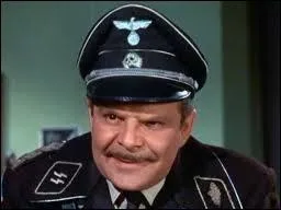 Celui-ci est un vrai poison, fouineur, et cauchemar autant pour les prisonniers que pour les Allemands contrlant le camp. Ce roquet de la Gestapo se nomme :