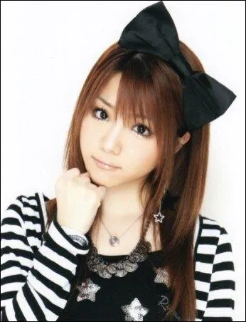 Quelle est la couleur de Reina Tanaka dans l'album ?