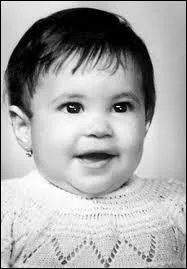 Qui se cache derrire ce charmant minois ?