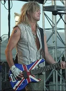 Bassiste du groupe Deff Leppard :