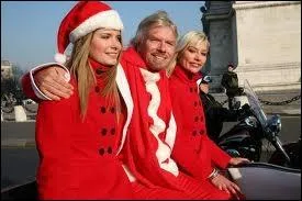 Reconnaissez-vous le grand boss qui fait le pre nol sur cette photo, il porte d'ailleurs les couleurs du logo de sa big socit ?