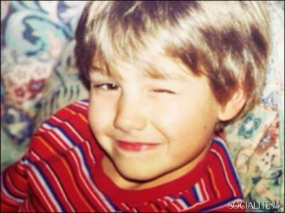 Qui est cet enfant souriant ?