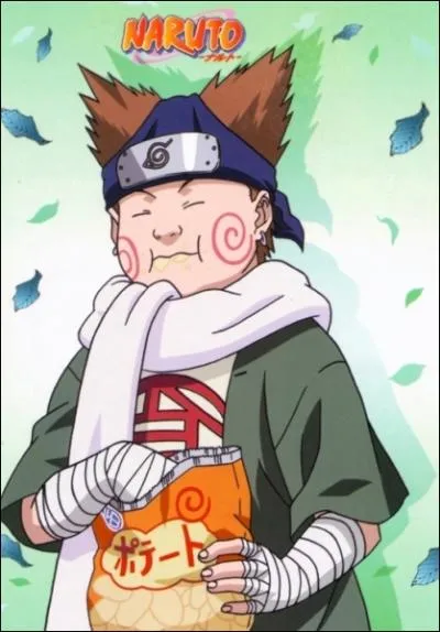 Que porte-t-il presque toujours  la main ?