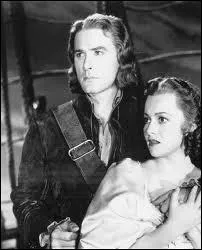 En 1935, quelle actrice joue aux cts d'Errol Flynn dans Capitaine Blood, film ralis par Michael Curtiz ?