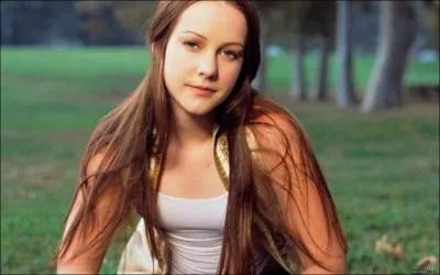 Quel est le tribut fminin du District 7 ?