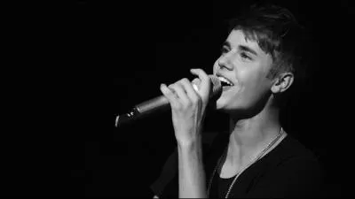 Avec qui partage-t-il un duo dans son CD   Believe  ?