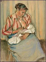 Femme allaitant son enfant.