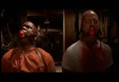 Dans le film  Pulp Fiction , comment s'appelle le policier qui veut abuser de Butch et Marsellus Wallace ?