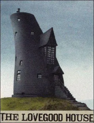 Qu'est-il marqu sur le panneau d'entre de la maison des Lovegood ?