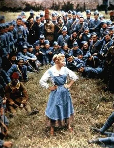  Pour le repos, le plaisir du militaire, Il est l-bas  deux pas de la fort Une maison aux murs tout couverts de lierre . La Madelon. Comment s'appelle cette maison ?