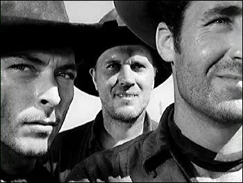 Au dbut du film, on voit trois hommes, les mchants,  la gare. Que demandent-ils au chef de gare ?