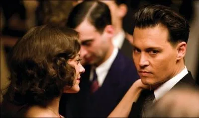 Comment meurt-il dans Public Ennemis ?