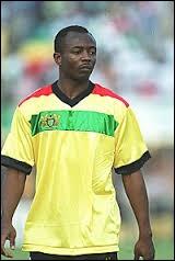 Né en 1964 à Domé au Ghana et ancien footballeur ghanéen, il fut l'un des meilleurs joueurs africains au début des années 1990, remportant notamment trois ballons d'or africain (1991, 1992 , 1993)
