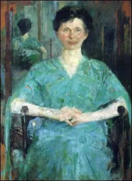 Portrait d'une femme en robe bleue.