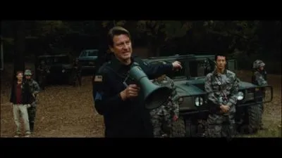 Qui est ce personnage (au milieu) ?