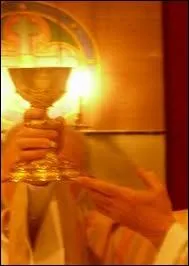 E : Partage du pain et du vin chez les catholiques
