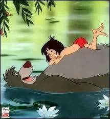 Par qui est lev Mowgli dans  Le livre de la jungle  ?