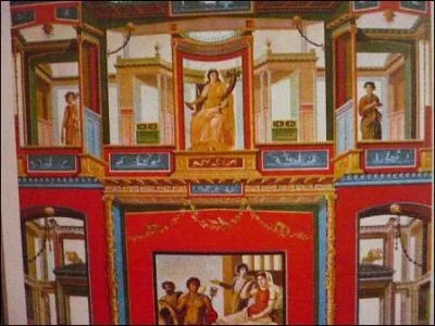 À Rome. 
La peinture romaine présente quatre styles. Qu'est-ce que le style des incrustations de la couleur sur les moulures imite-t-il ? Agrandissez la photo.