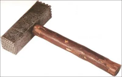 Ce marteau est aussi destin au travail de la pierre. Quel est son nom ?