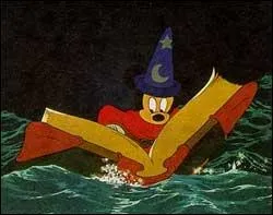 Comment Mickey tente-t-il de mettre fin  l'inondation cause par les balais (avant de consulter le grimoire) en vain ?