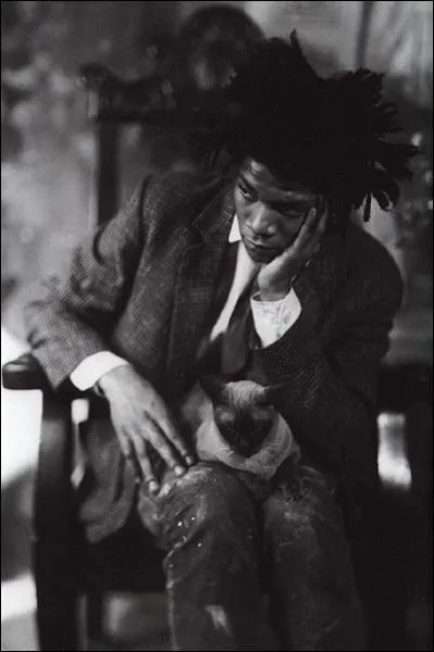 Ce trs digne siamois est sur les genoux d'un grand peintre disparu. Il s'agit de ?