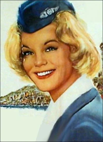 En quoi se dguise la divine Romy Schneider dans le film  Mademoiselle Ange  pour empcher un homme de se suicider par dpit amoureux ?