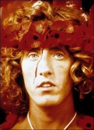 Dans quelle comdie musicale un homme devenu aveugle, sourd et muet recouvre-t-il l'usage de ses sens aprs avoir t projet  travers un miroir, devenant par l-mme le nouveau  Messie  ?